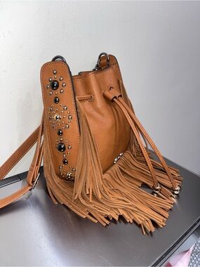 Jessica Simpson western fringe drawstring bag